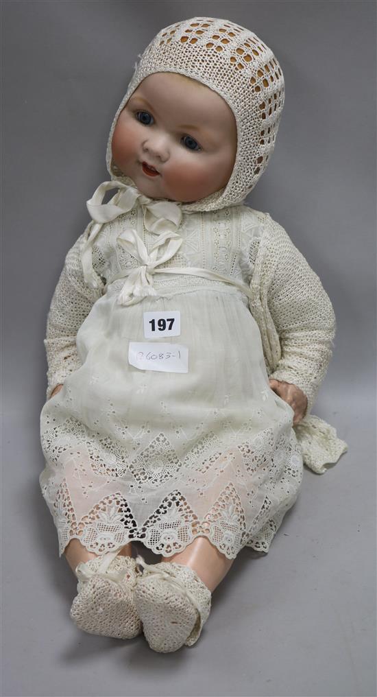 An Armand Marseille doll length 63cm